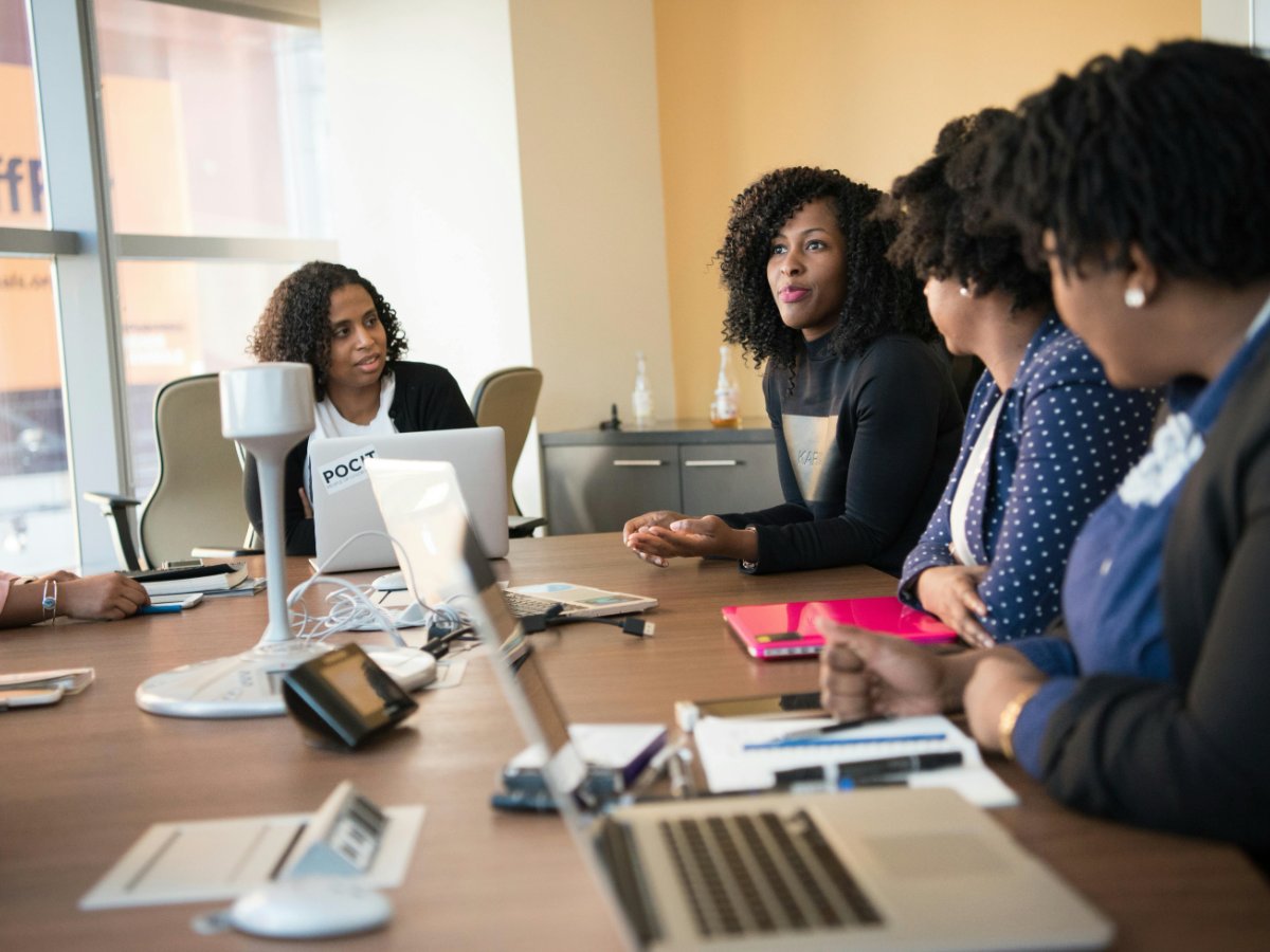 A startup executive assistant in Austin comparing a monthly postage meter bill against a wholesale roll of forever stamps to decide on office efficiency.